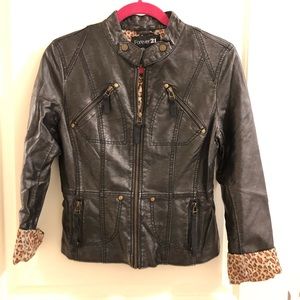 Leather jacket with leopard lining